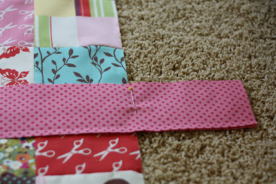 Charm Pack Baby Quilt Tutorial featured by top US quilting blog, Diary of a Quilter