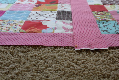 Charm Pack Baby Quilt Tutorial featured by top US quilting blog, Diary of a Quilter