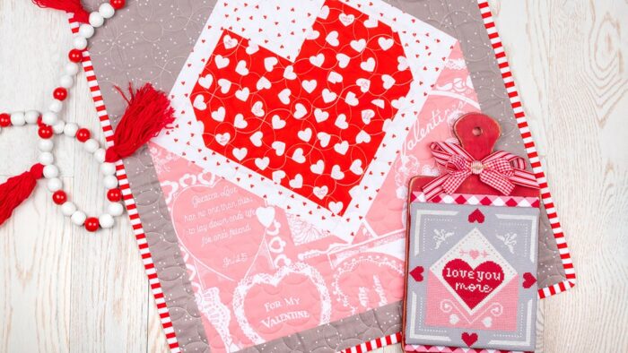 Free Valentine mini quilt and cross stitch pattern from The Fat Quarter Shop
