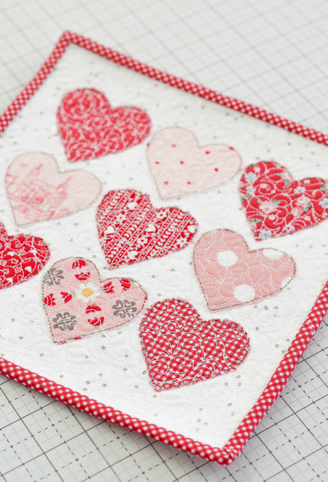 Machine applique and quilted mini heart quilt by Amy Smart