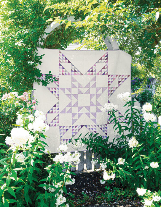 Monochromatic Purple Half Square Triangle quilt