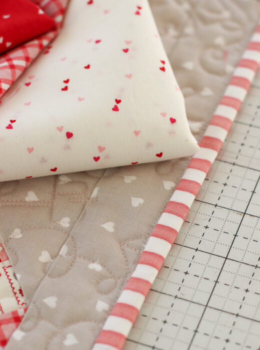 Pink stripe quilt binding fabric from Riley Blake Designs and J. Wecker Frisch