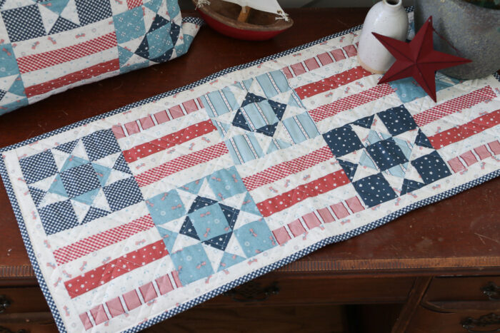 Quilted patchwork Stars and Stripes table runner tutorial perfect for the 4th of July.