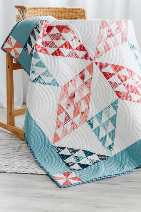 Traditional patchwork star baby quilt - Sugarhouse Star pattern by Amy Smart featuring the Portsmouth fabric collection.