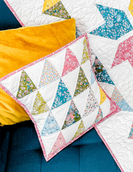 Half Square triangle pillow made with Liberty of London quilting cotton.