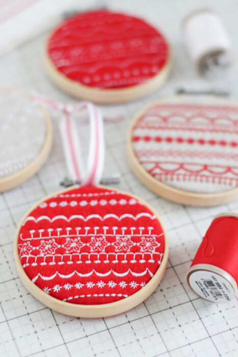Handmade Christmas hoop-art ornament tutorial made with decorative Baby Lock sewing machine stitches.