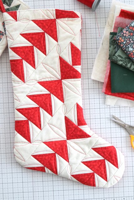 Red and white flying geese quilted stocking
