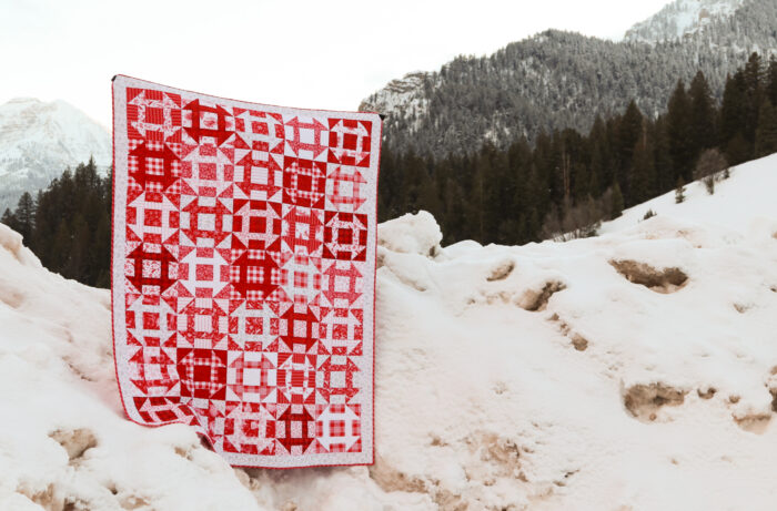 Red and white Churn Dash quilt made with Fast Churn Dash pattern by Amy Smart.