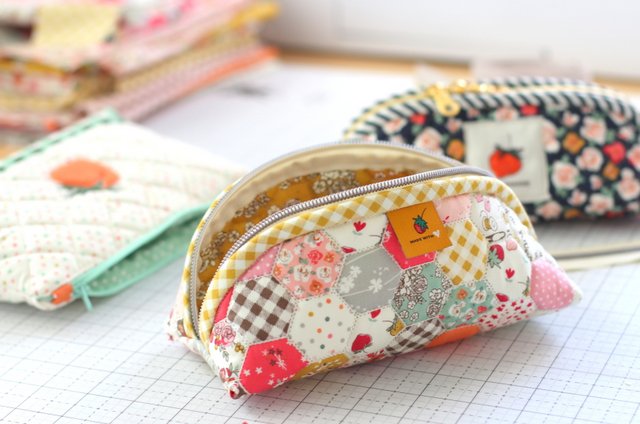 Quilted hexagon cheater print panel by Minki Kim for Trixie Pouch