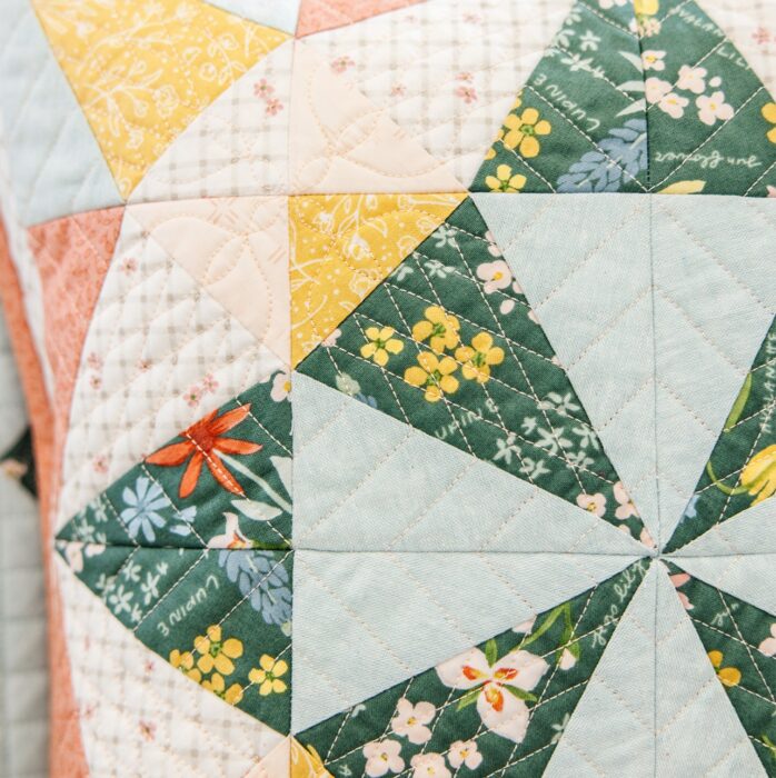 Quilted pillow project made with the Perfectly Pieced subscription from M.E. Time Embroidery.