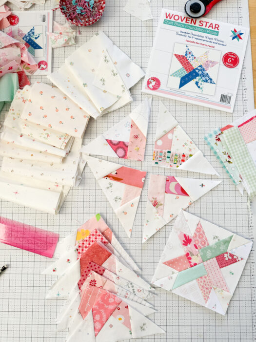 Woven Star foundation paper-pieced quilt blocks made with pattern from the Fat Quarter Shop and lots of pink scraps.