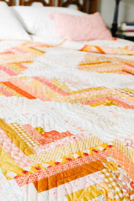 Gold and Orange Improv Log Cabin quilt made by Amy Smart of Diary of a Quilter