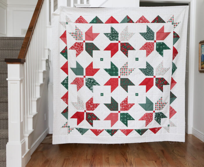 Fat Quarter Star quilt pattern by Amy Smart made with Riley Blake Christmas fabric