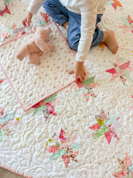 Baby quilt made from Woven Star FPP blocks and lots of low volume Hush Hush prints from Riley Blake.