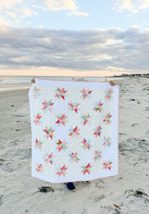 Baby quilt made from Woven Star FPP blocks and lots of low volume Hush Hush prints from Riley Blake.
