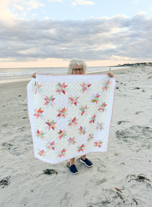 Baby quilt made from Woven Star FPP blocks and lots of low volume Hush Hush prints from Riley Blake.