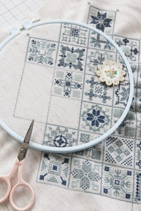 Amish Sampler Cross stitch made by Amy Smart in monochromatic blues