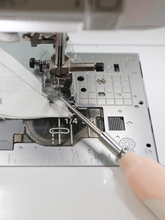 Use a stiletto tool to improve quilt piecing accuracy