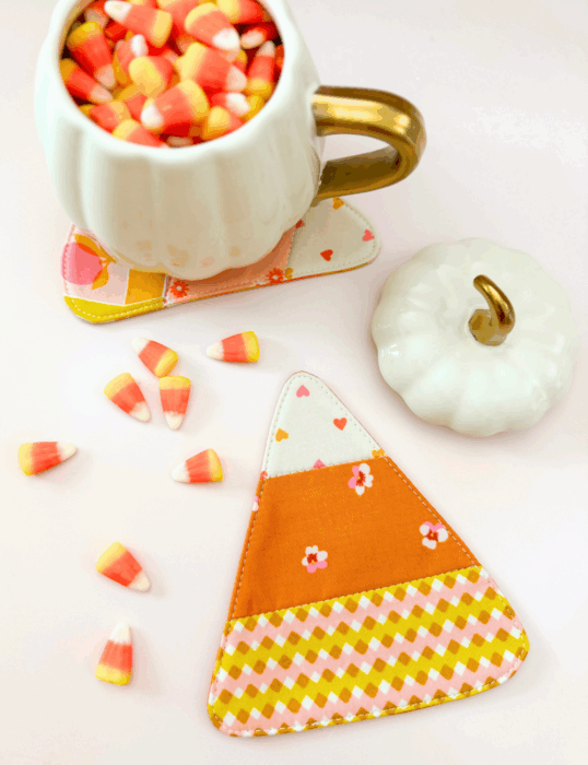 Use fabric scraps to make these simple Candy Corn fabric coasters