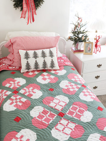 Heart Sampler Quilt: Scandi Hearts Quilt Pattern by Amy Smart in red, white, and green. Twin Size